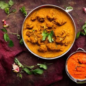 Tantalizing Indian curry dishes with fresh herbs, rich colors, and spices.